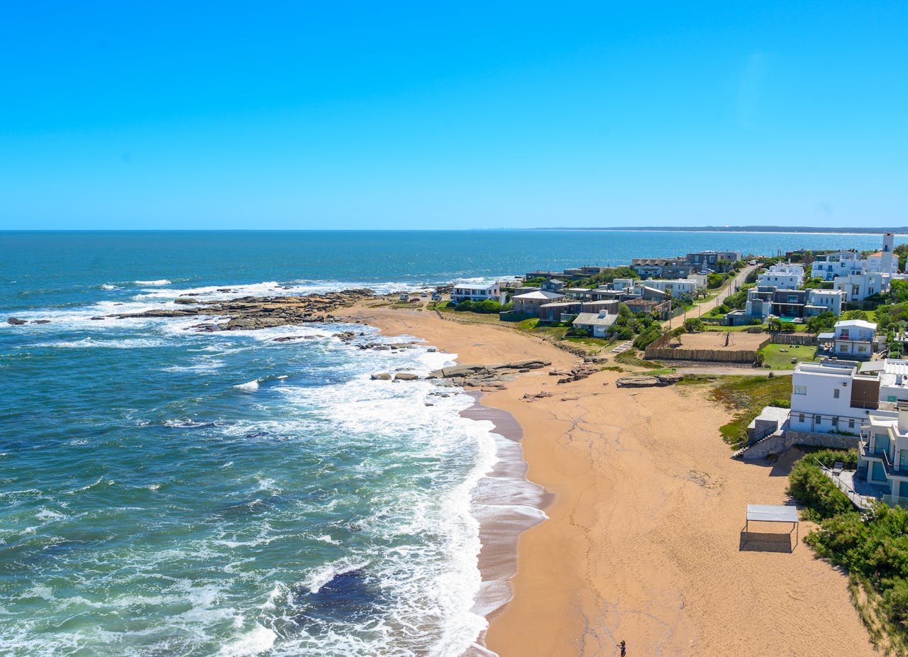 Aerial view of José Ignacio beach with clear blue waters, Uruguay