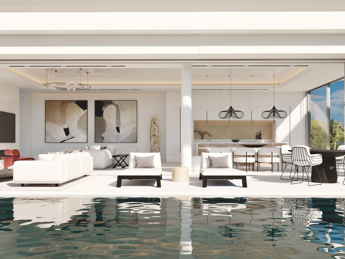 Indoor-outdoor pool with natural materials — biophilic luxury villa design Costa del Sol