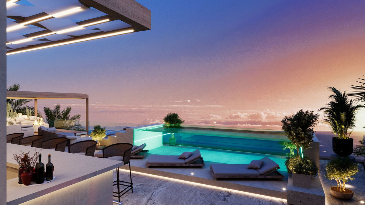 Rooftop infinity pool at sunset — Marbella luxury real estate