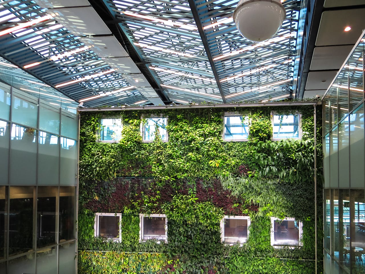 Lush vertical living wall — green roof and biophilic design, sustainable luxury architecture Costa del Sol